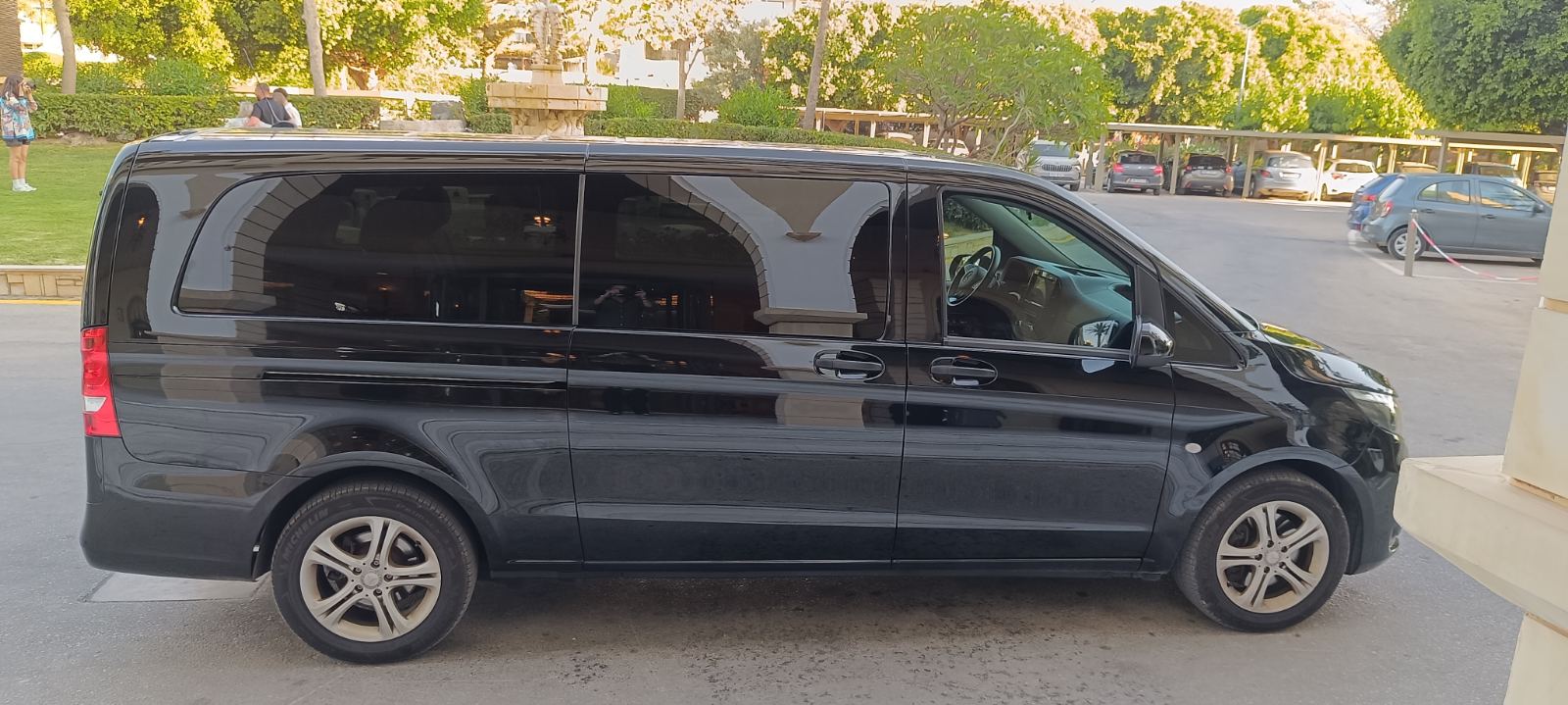 The chauffeur vehicle parked at a resort in Crete